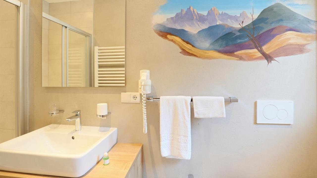Pension Alpenhof B&B คอลเลอิซาร์โค ภายนอก รูปภาพ