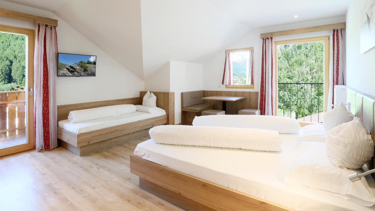 Pension Alpenhof B&B คอลเลอิซาร์โค ภายนอก รูปภาพ